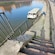 Stairs leading to a catamaran docked in the Arno River in the Tuscany region of Italy